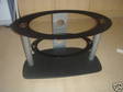 Oval glass and black tv stand (enfield)